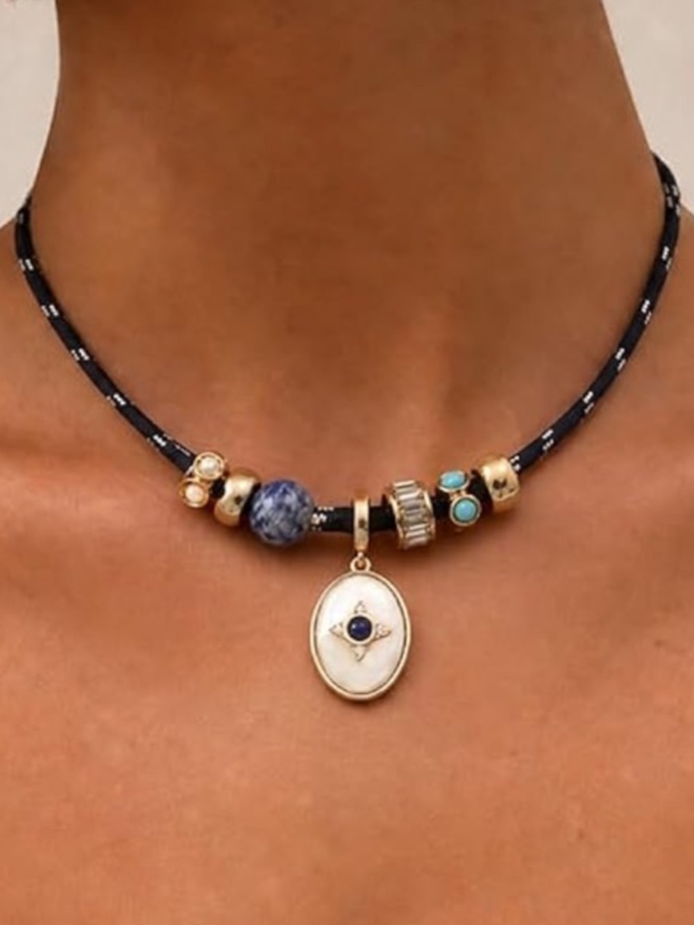 Gold Pendant Necklace with Navy Cord and Turquoise Accents